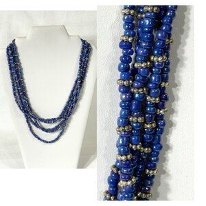 Silver and cornflower blue bead five-strand necklace.